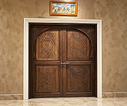 Dining room doors hand-carved by artisans from Marrakech