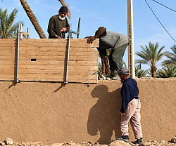 Tamelaste specialists, builders of the earthen walls that delimit the property